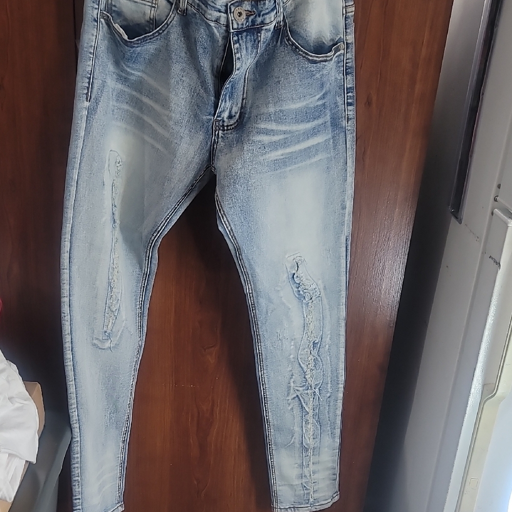 Women's Distressed Light Blue Jeans